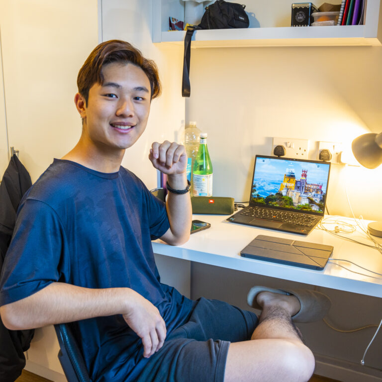 boy in his dorm room