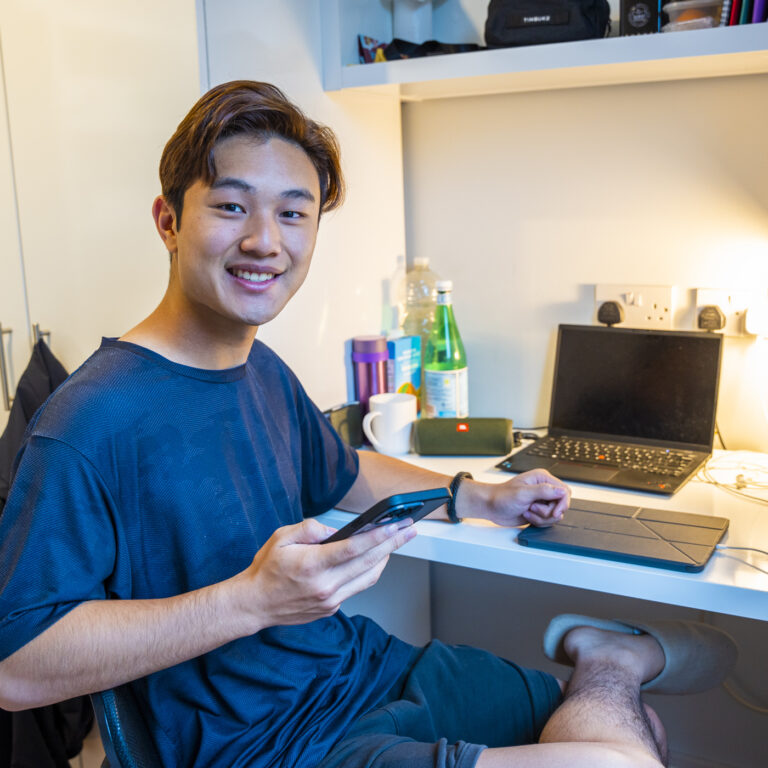 boy in his dorm room