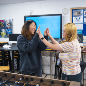 students enjoying the common room space