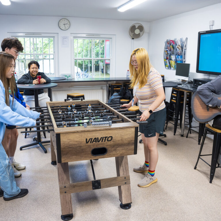 students enjoying the common room space