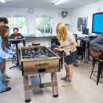 students enjoying the common room space