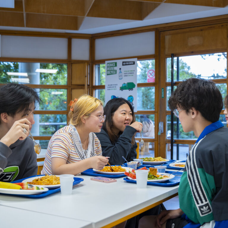 students eating in the cafeteria