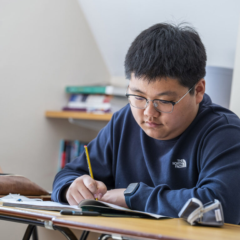 boy working in class