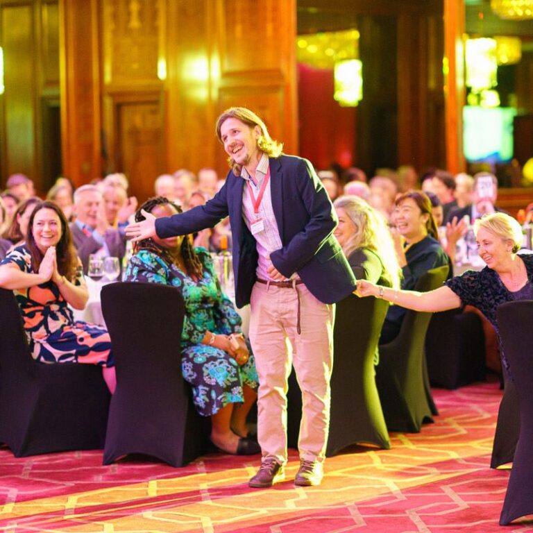 man presenting at an event